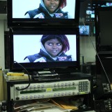 Assignment editors can call up any number of feeds on these monitors. On this night, Courtois was watching another station's early broadcast. She is also able to use the router at the bottom of the picture to look at feeds from a truck, from satellite, or cameras within the building.
